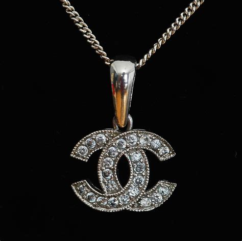 chanel logo silver necklace|chanel long necklace with logo.